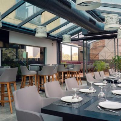 The Skylight Garden Cafe - Hotel Fern Residency